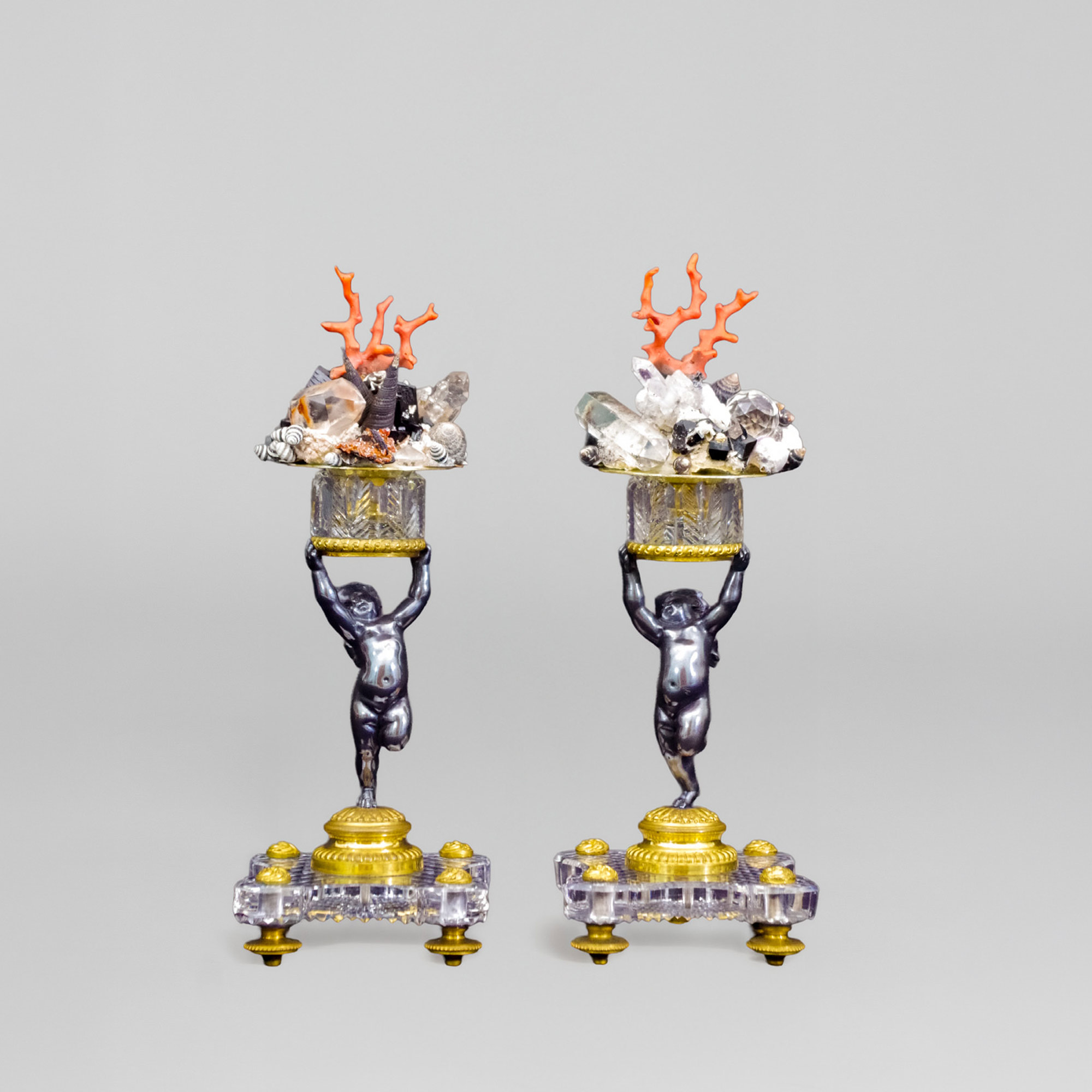 Paar Puttis mit Grottenzier